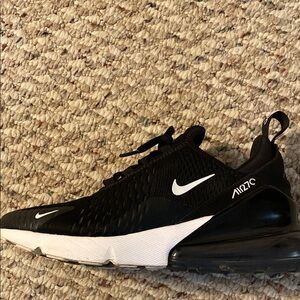 Nike Black and White Sneakers with Breathable Fabric and Air Cushion